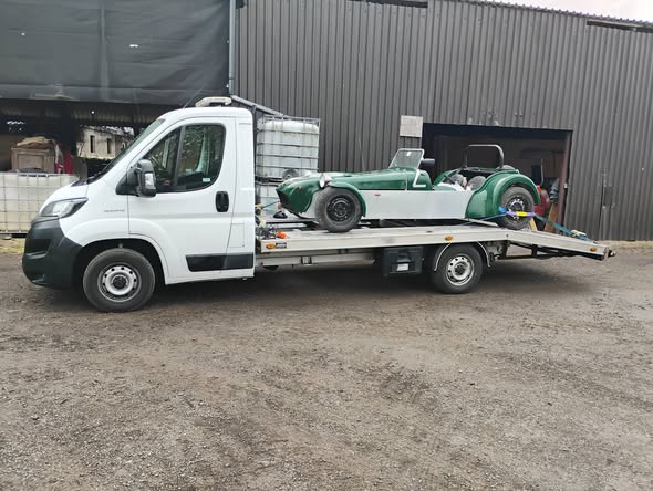 Green vintage-style kit car secured on Ian's transporter in Salisbury, ready for delivery to Tewkesbury as a non-runner recovery