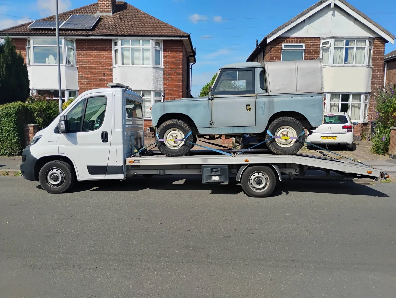 Classic Series 2 Land Rover loaded on Ian's transporter in Derby, ready for delivery to Ledbury