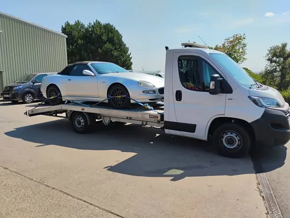 Silver Maserati Spyder loaded on Ian's transporter in Ross-on-Wye, ready for delivery to Henley-in-Arden