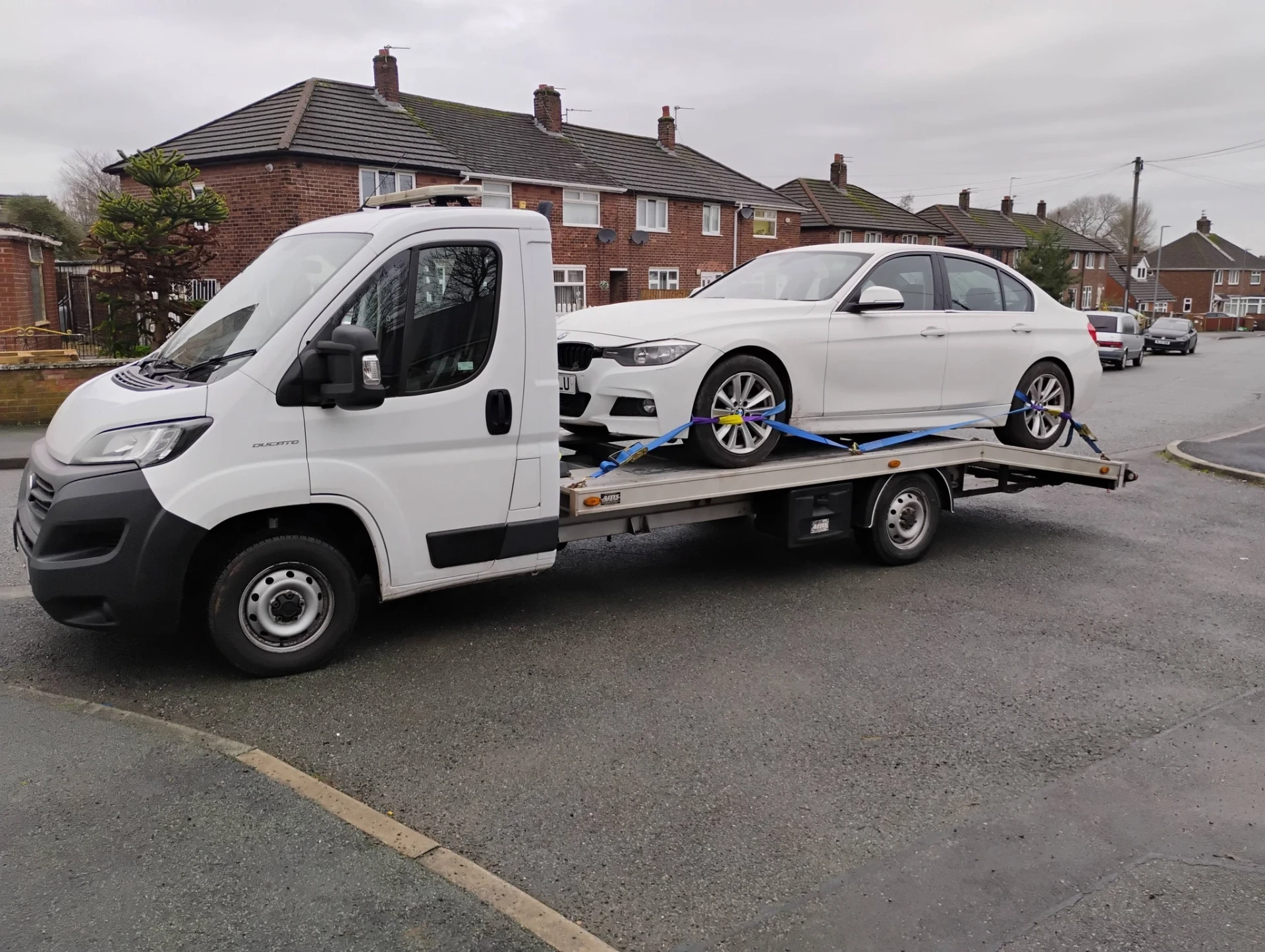 White BMW 3 Series modern delivery